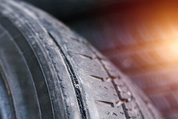Close-up of vehicle tire showing excessive wear © AlexGo