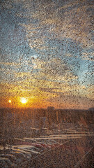 Naklejka premium golden sunlight reflected through the broken window