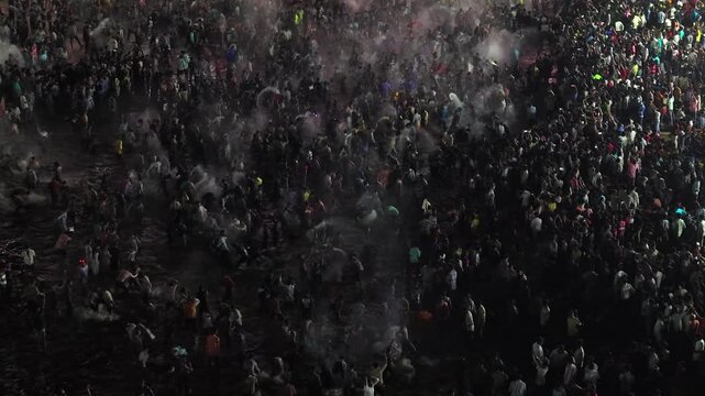 Aerial Night View of Azhagar Festival Crowd Near Vaigai River in Madurai Tamil Nadu India