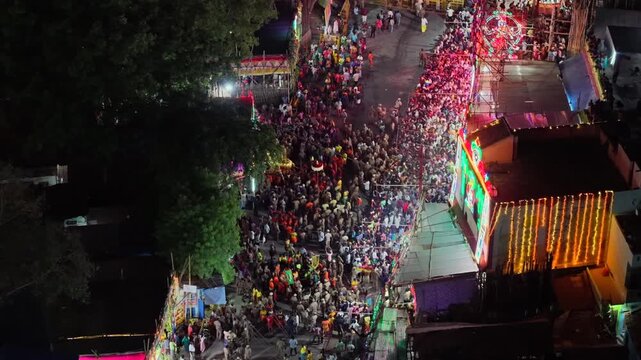 Aerial Night View of Azhagar Festival Crowd Near Vaigai River in Madurai Tamil Nadu India