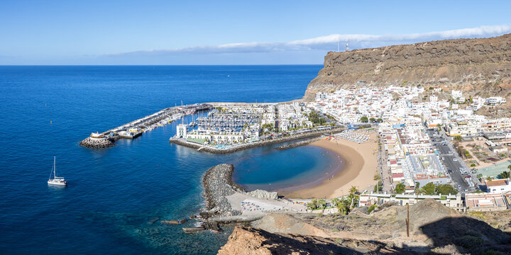 Puerto de Mogan on Gran Canaria island from above marina holiday by the sea panorama beach in Spain