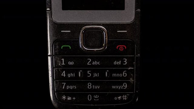 retro and old mobile telephones keypads in a sequence