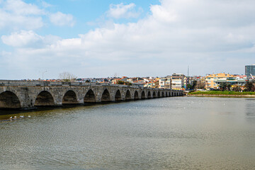 Fototapeta premium The scenic views of the historical stone Mimar Sinan Bridge in Silivri, Turkey, were built by the well-known architect Mimar Sinan in the 16th century.