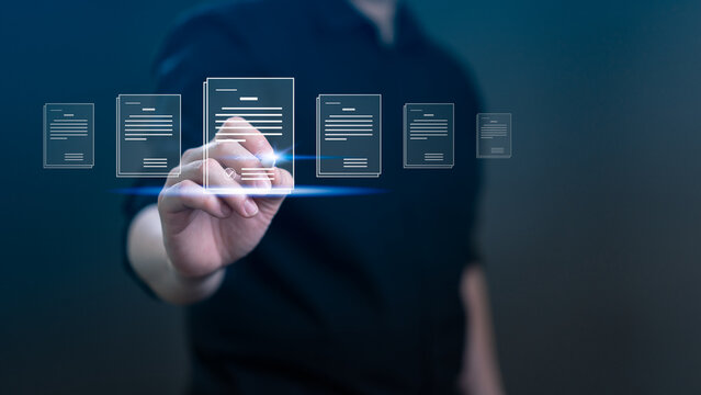 Businessman hand signing electronic document on virtual screen. Concept of digital signature, e-signing, paperless office, and online contract management with futuristic glowing interface.