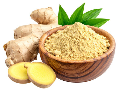 Fresh ginger root, slices, and powder in a wooden bowl with green leaves