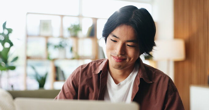 Creative, online and man with laptop in office, content creator and happy with thumbnail on website. Social media, video editing and person with smile for assignment, review or upload with technology