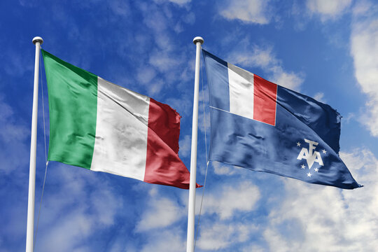 Italy and French Southern and Antarctic Lands flags waving in a clear blue sky, symbolizing a powerful diplomacy a strategic partnership, and a shared vision of unity for a sustainable future.