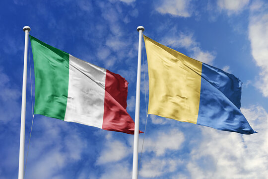 Italy and Lampedusa and Linosa flags waving in a clear blue sky, symbolizing a powerful diplomacy a strategic partnership, and a shared vision of unity for a sustainable future.