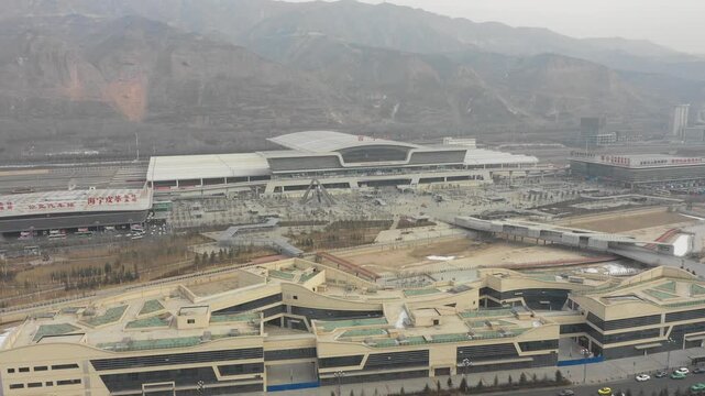 Establishing drone shot of modern Xining railway station, transportation and infrastructure in China
