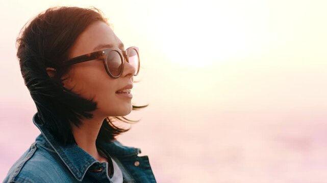 Woman, relax and sunglasses outdoor with summer holiday, wind and thinking for wellness on getaway. Space, female person and shades with reflection, remember memory and breeze for serene vacation.