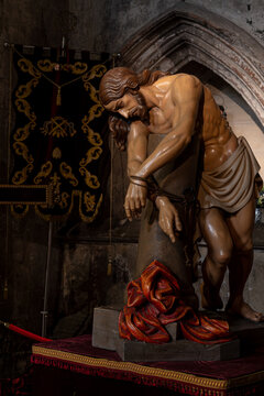 Close-up of a polychrome wooden religious statue inside the historic Santa Maria de Palacio church in Logrono