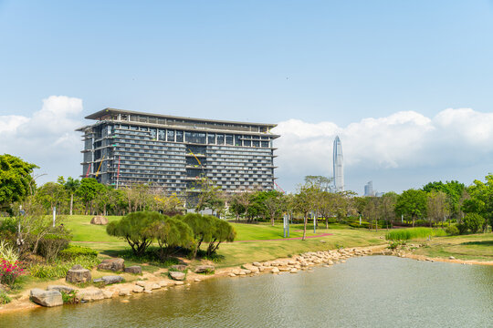 modern skyscrappers view from publick park in Shen Zhen with Building under construction of hotels and conference centers for APEC