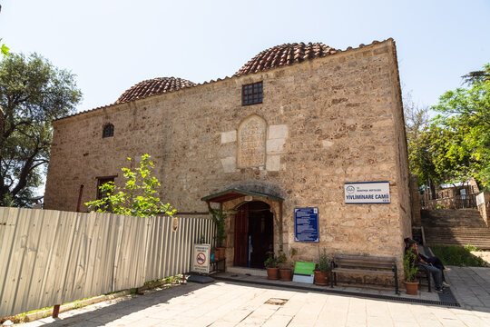 Antalya, Turkey - 28 April 2022: historic Yivli Minare Mosque in the old city centre of Antalya
