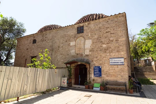 Antalya, Turkey - 28 April 2022: historic Yivli Minare Mosque in the old city centre of Antalya