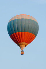 Naklejka premium tricolor balloon in sky, red blue white, flying in sky