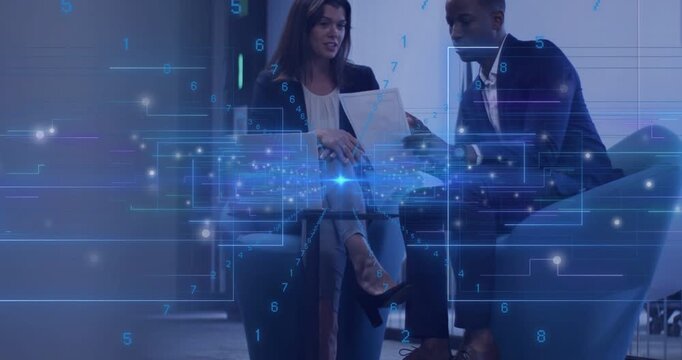 Camera rising revealing business duo reviewing paper in office lounge, with blue overlay and laptop