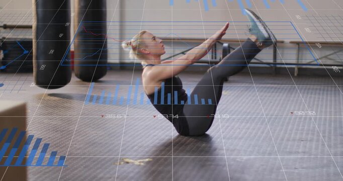 Woman lifting arms and legs, initiating V-up while blue HUD overlays updating fitness metrics