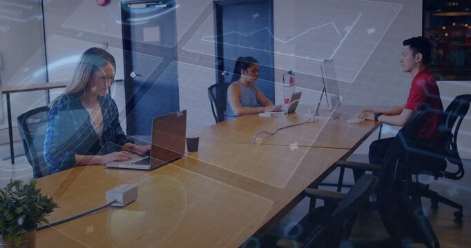 Vertical video: Overlay appearing, 3 typing on laptops in office, right red shirt, reviewing data