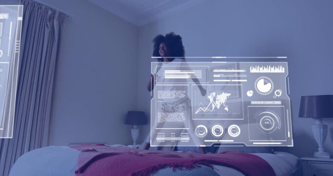 Vertical video: Using brush as mic, child in pjs singing, jumping on bed at home, UI panels rising