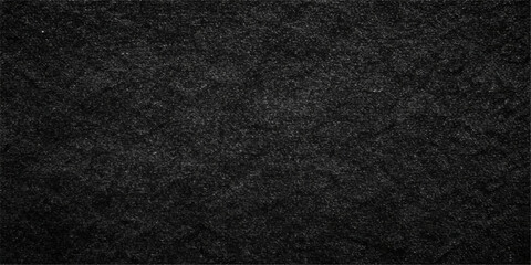 Obraz premium A dark macro background featuring a textured black leather and fabric material surface with a rough textile pattern and a subtle grey grunge design