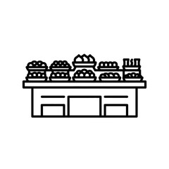 Obraz premium Small Bakery Shop with Assorted Cakes and Pastries Displayed on Shelves