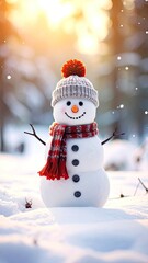 Obraz premium A cheerful snowman stands in a snowy landscape, adorned with a knitted hat and scarf.