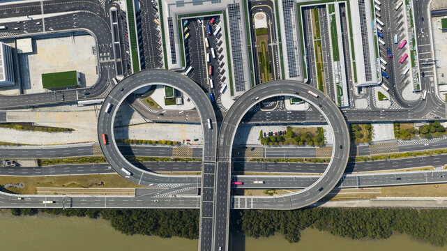 Aerial view of complex looping highway interchange near Shenzhen Bao'an International Airport, Shenzhen, China.