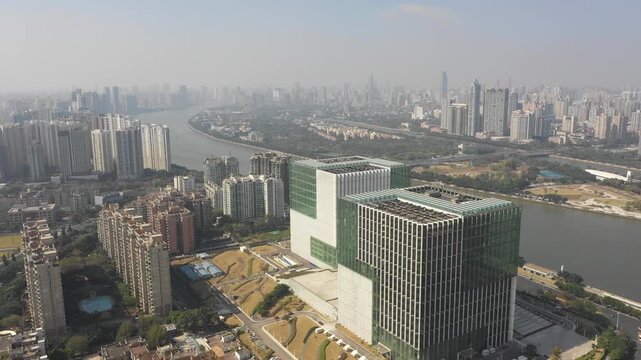 Aerial view of offices and residential buildings along Pearl River in Guangzhou, China
