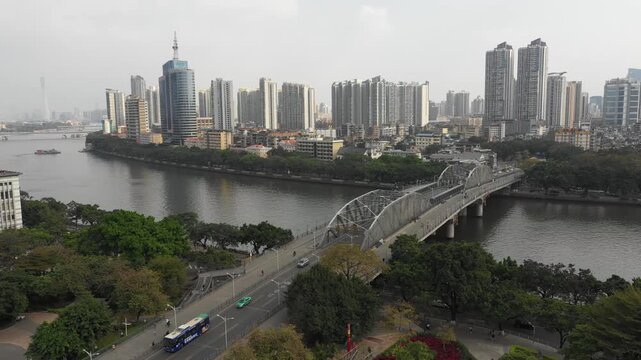 Beautiful aerial view of classic bridge and modern skyline of downtown Guangzhou, China
