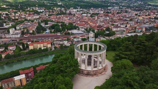Aerial drone view of the Mausoleum of Cesare Battisti in Parco Naturale del Doss Trento, Italy.