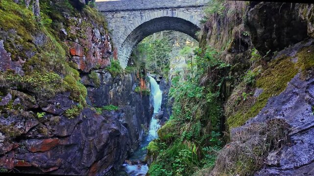 Pont d'Espagne Bridge in Cauterets, pine forest with mountain river, Pyrenees , France in Europe