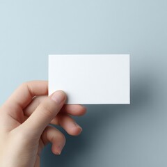 Fototapeta premium Hand holding blank business card branding identity concept