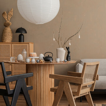 Neutral Easter-themed interior with natural textures, wooden furniture, and minimal spring decor.