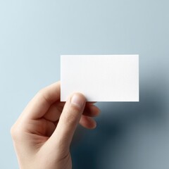 Fototapeta premium Hand holding blank business card branding identity concept