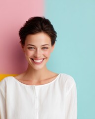 Fototapeta premium Young woman with bright white smile on colorful background, teeth whitening concept