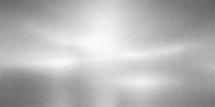 A polished silver stainless steel plate features a brushed metal texture with a shiny gray metallic surface and light reflection for a modern industrial background design