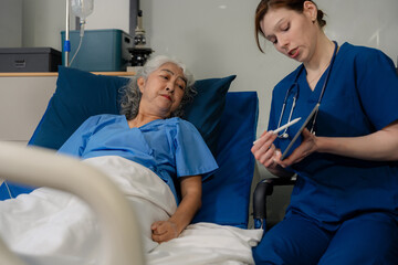 Fototapeta premium Doctor Explaining Brain Scan Results to Senior Patient in Hospital Consultation.