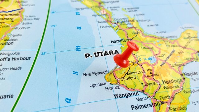 View of New Plymouth, is the major city of the Taranaki region on the west coast of the North Island of New Zealand, on a geographical map of Australia and New Zealand, marked with red push pin