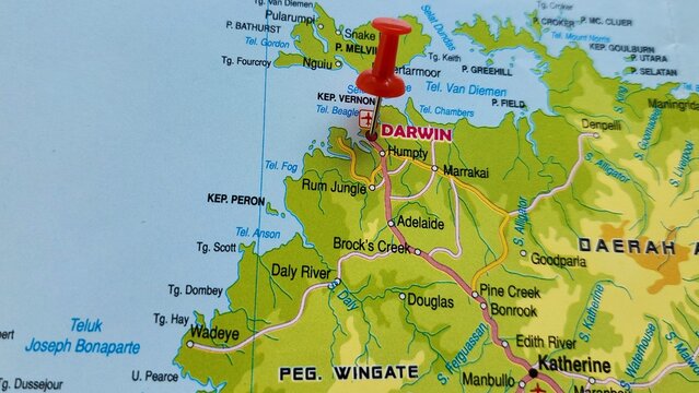 View of Darwin, is the capital city of the Northern Territory, Australia, on a geographical map of Australia and New Zealand, marked with red pushpin