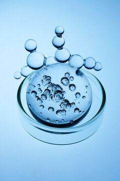 Abstract cosmetic lab. Chemical molecule structure over bubbling petri dish