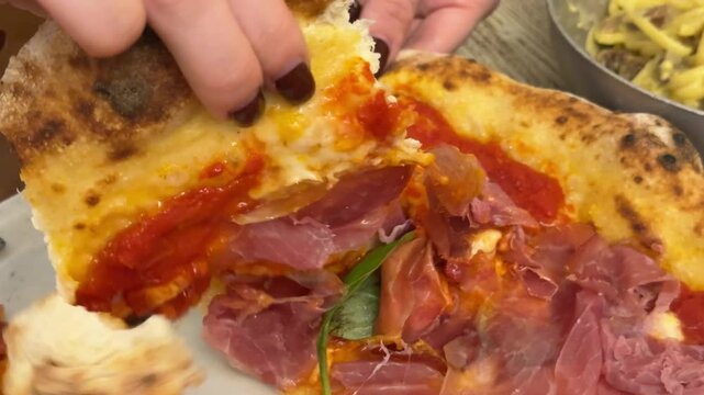 Italian pizza with chicken and bacon, cheese, tomatoes and sauce. Fast food, sliced pizza. High quality 4k footage