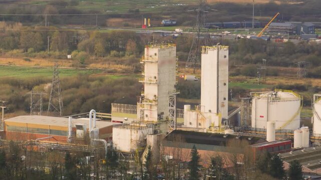 Industrial gases production and distribution facility with gas holders. Cryogenic air separation, producing liquid oxygen, liquid nitrogen, liquid argon and separation of hydrogen.