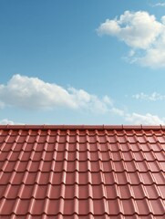 Fototapeta premium Red Tile Roof and Blue Sky: A close-up shot of a vibrant red tile roof contrasting against a clear, azure sky with fluffy white clouds.