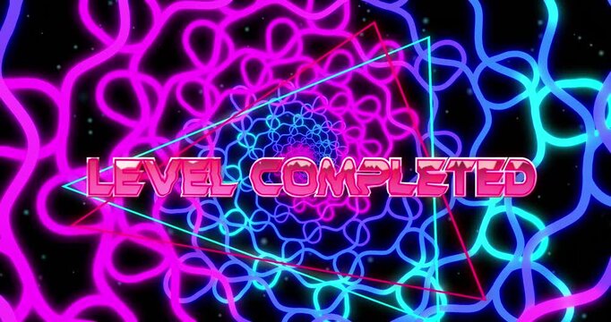 Animation of level completed text banner against tangled blue and purple light trails spinning