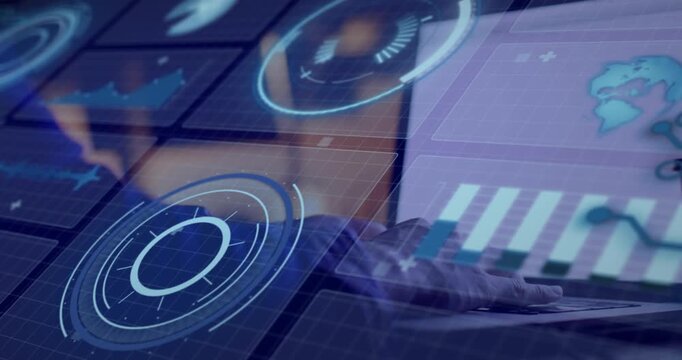 Animation of loading circles, graphs, globe over cropped hands of man working on laptop