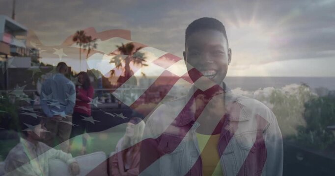 Center host nodding and smiling initiating flag overlay sweeping across terrace showing business ad