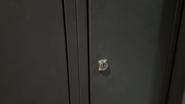 Close-up of locked metal storage locker door with key lock, security and access control concept, personal belongings protection and secure storage solution