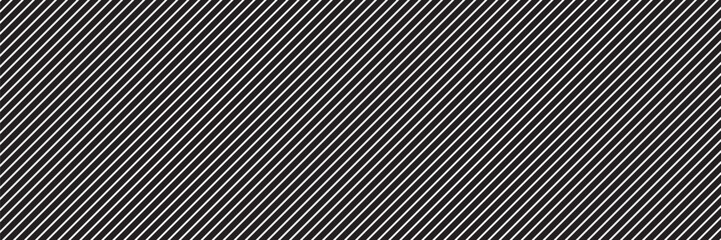 Obraz premium Thin slash line seamless pattern. Repeated fine diagonal lines background. Pinstripe wallpaper. Black and white tilted slanted strip backdrop. Repeating oblique linear texture overlay.eps10