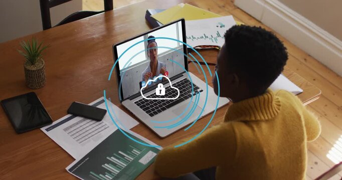 Animation of online icons over caucasian woman on laptop video using laptop video call