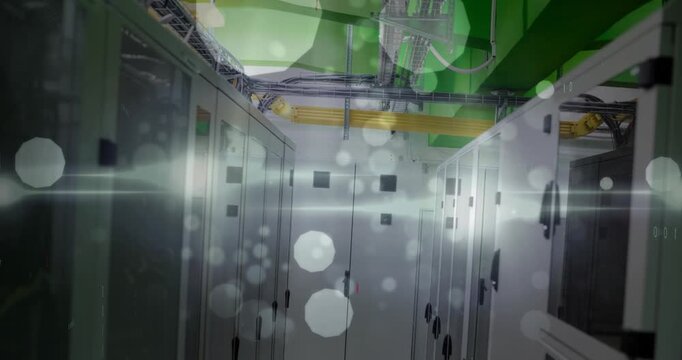 Animation of data processing, light trails and white spots floating against computer server room